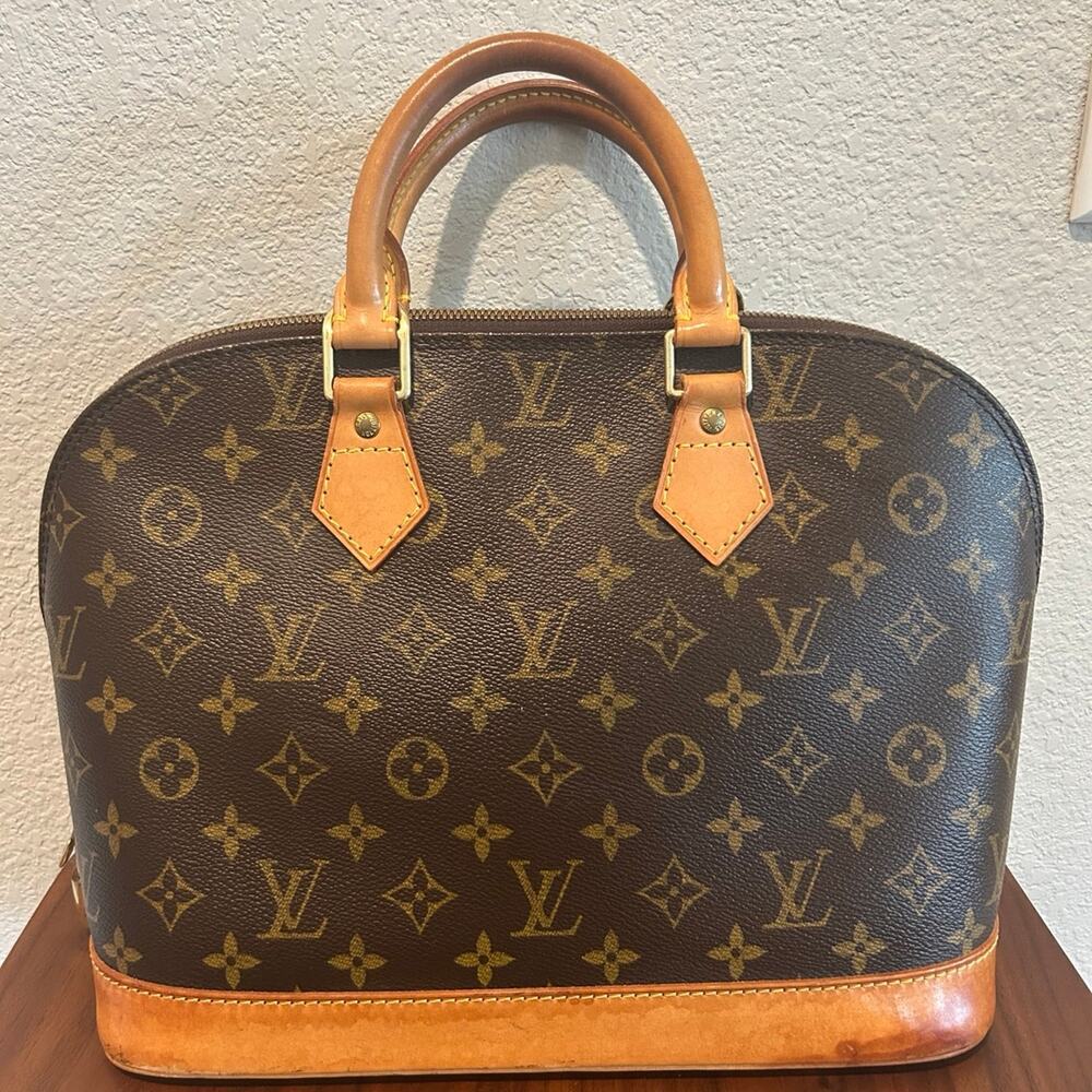 Louis Vuitton Alma PM Handbag with COA